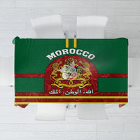 Morocco tablecloth with green background, gold border, and central coat of arms crest