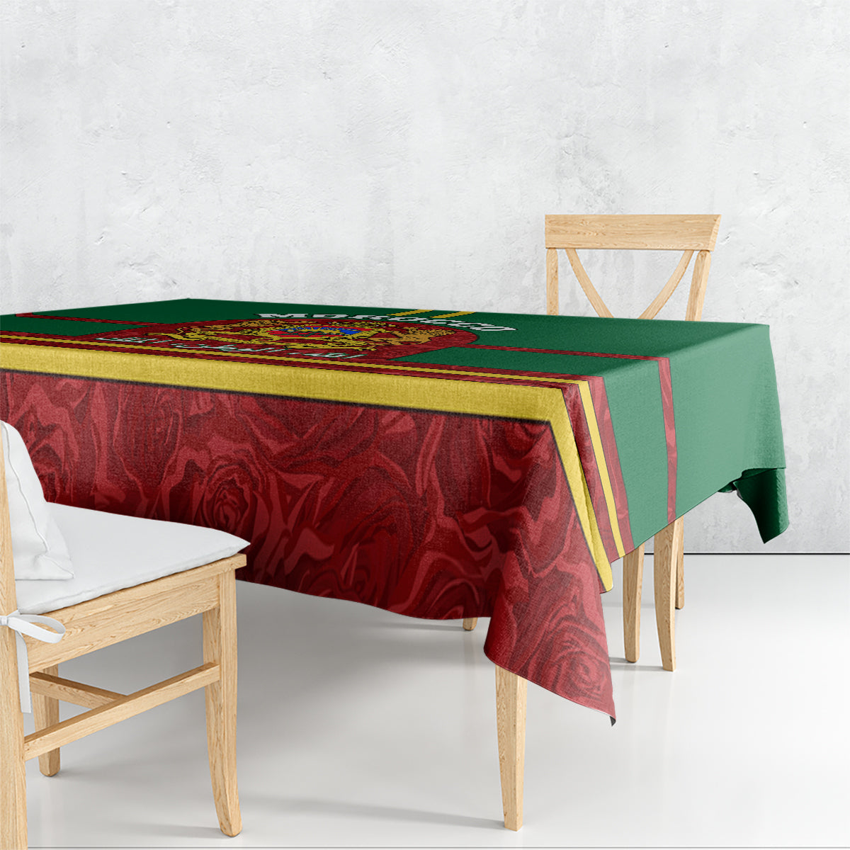 Morocco proclamation tablecloth draped on a bench; green and red panels with gold stripes