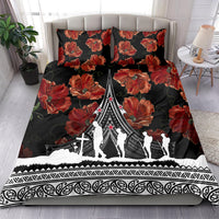 Black duvet cover and two pillowcases with red poppy pattern and white figure border