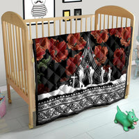 Black quilt for a crib with red poppies, white monument design, and patterned Polynesian border