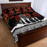 Black quilt bedspread with red poppy print, white Polynesian border, aircraft and figure silhouettes.