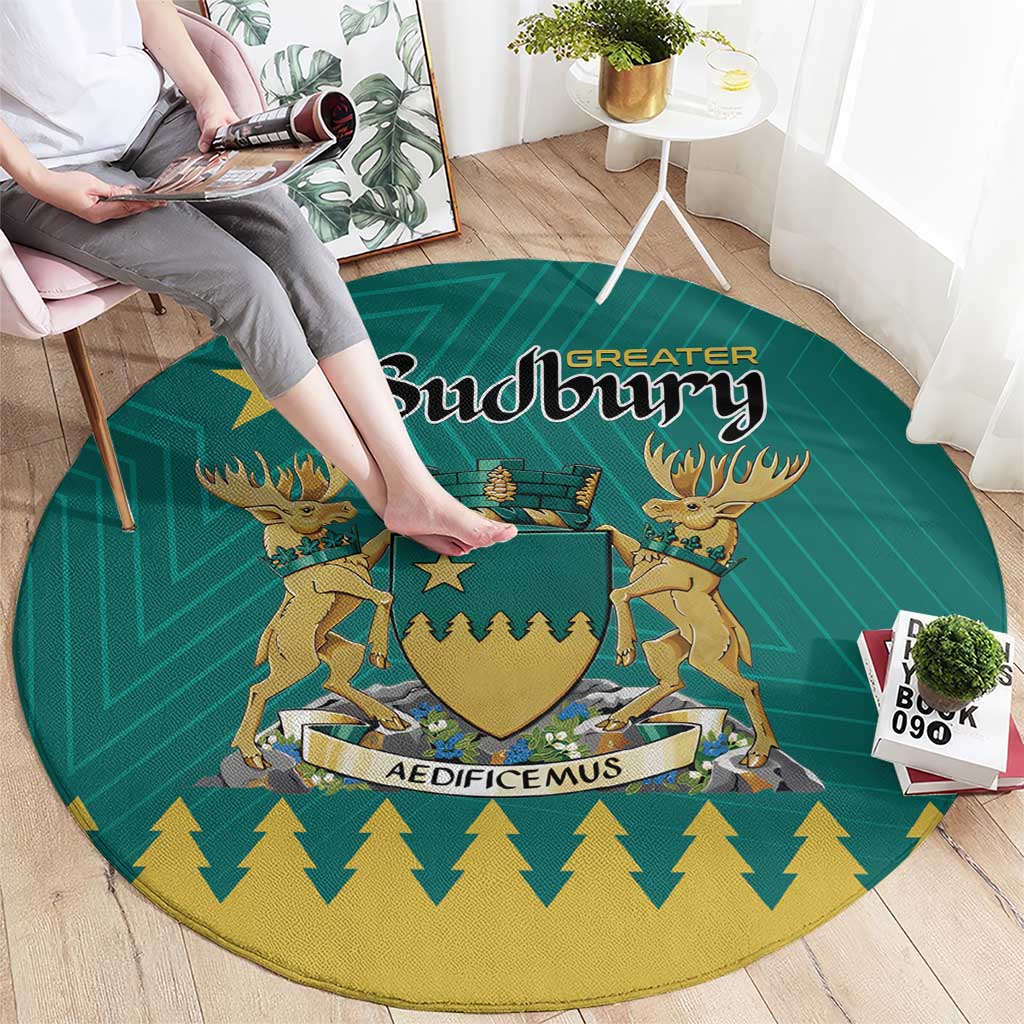 Green round carpet with Sudbury crest center and gold patterned edge