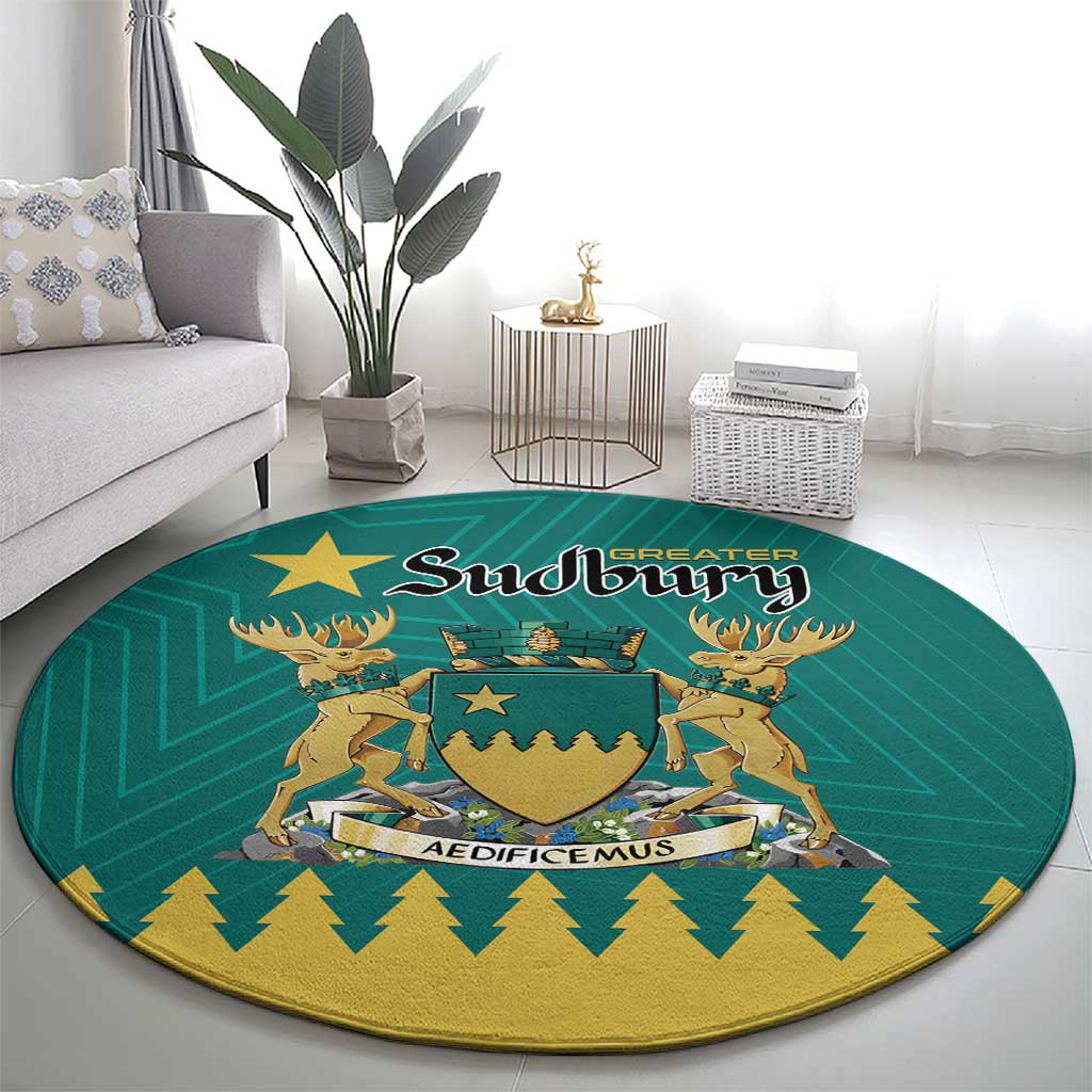 Green round carpet featuring the Sudbury emblem and gold decorative border