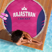 Round pink beach blanket with navy side panels and white fringe, RAJASTHAN CRICKET logo