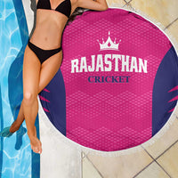 Round pink beach blanket with navy side panels and white fringe, RAJASTHAN CRICKET center print
