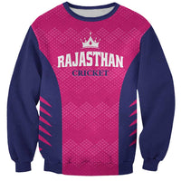 Pink and navy cricket sweatshirt with front crest and bold text graphic, crew neck