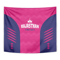 Pink and navy cricket tapestry close view with Rajasthan Cricket logo and crown emblem.