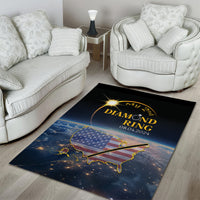 Black area rug featuring gold diamond ring graphic and starry USA map