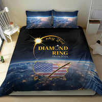 Black and blue total eclipse bedding set with gold ring-themed text graphic and two pillows