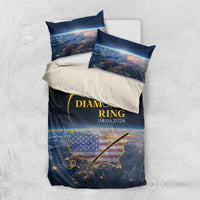 Folded total eclipse bedding set with black/blue duvet and two matching pillowcases