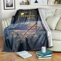 Black blanket draped on sofa with diamond ring text, US map graphic, and 08.04.2024