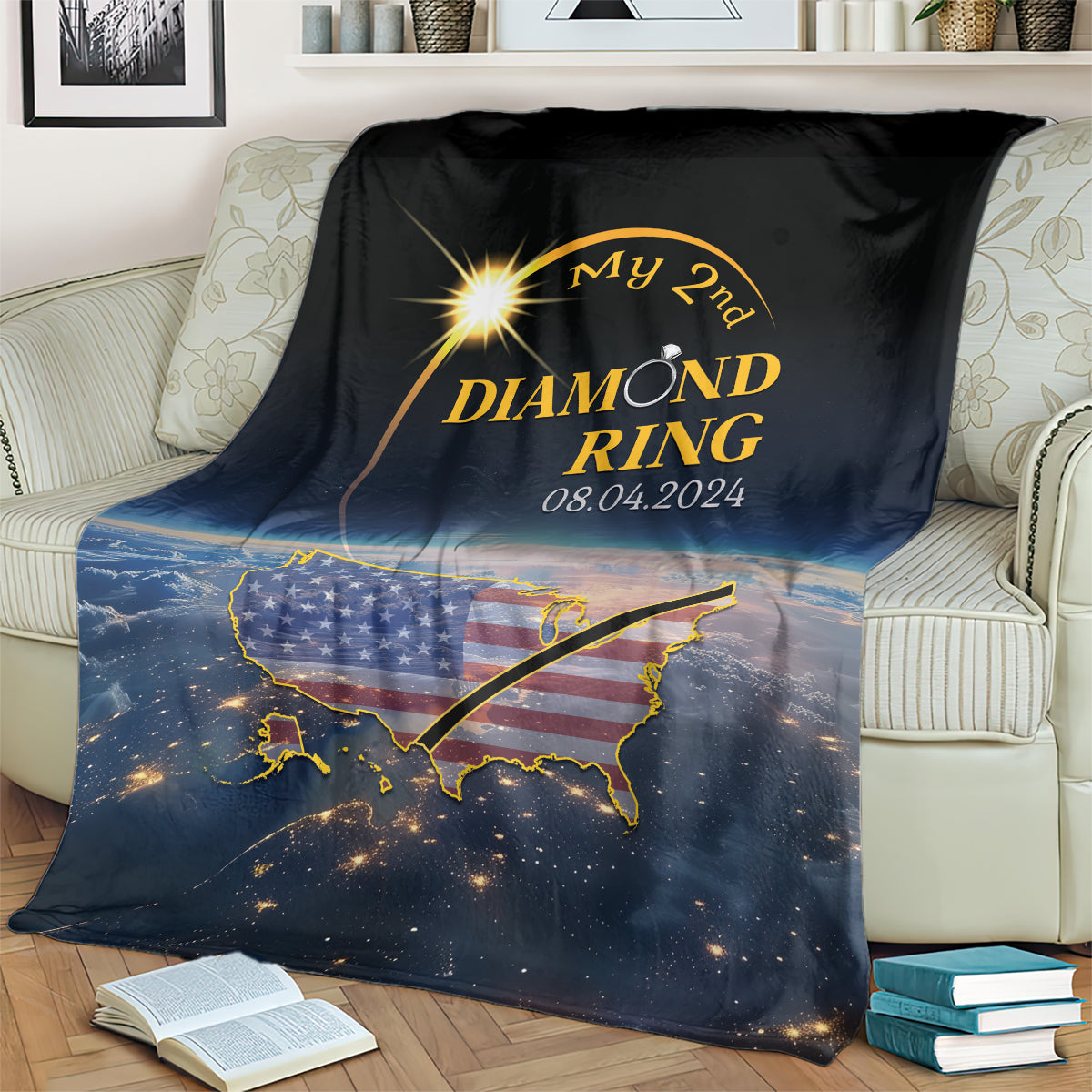 Black blanket draped over sofa with diamond ring text, US map graphic, and 08.04.2024