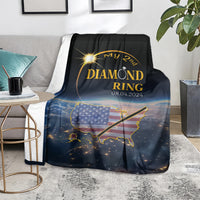 Black blanket laid on floor with diamond ring text, US map graphic, and 08.04.2024