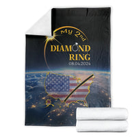 Black blanket showing diamond ring text, US map graphic, and date 08.04.2024