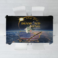Black tablecloth with 'My 2nd Diamond Ring' graphic, gold eclipse light and map