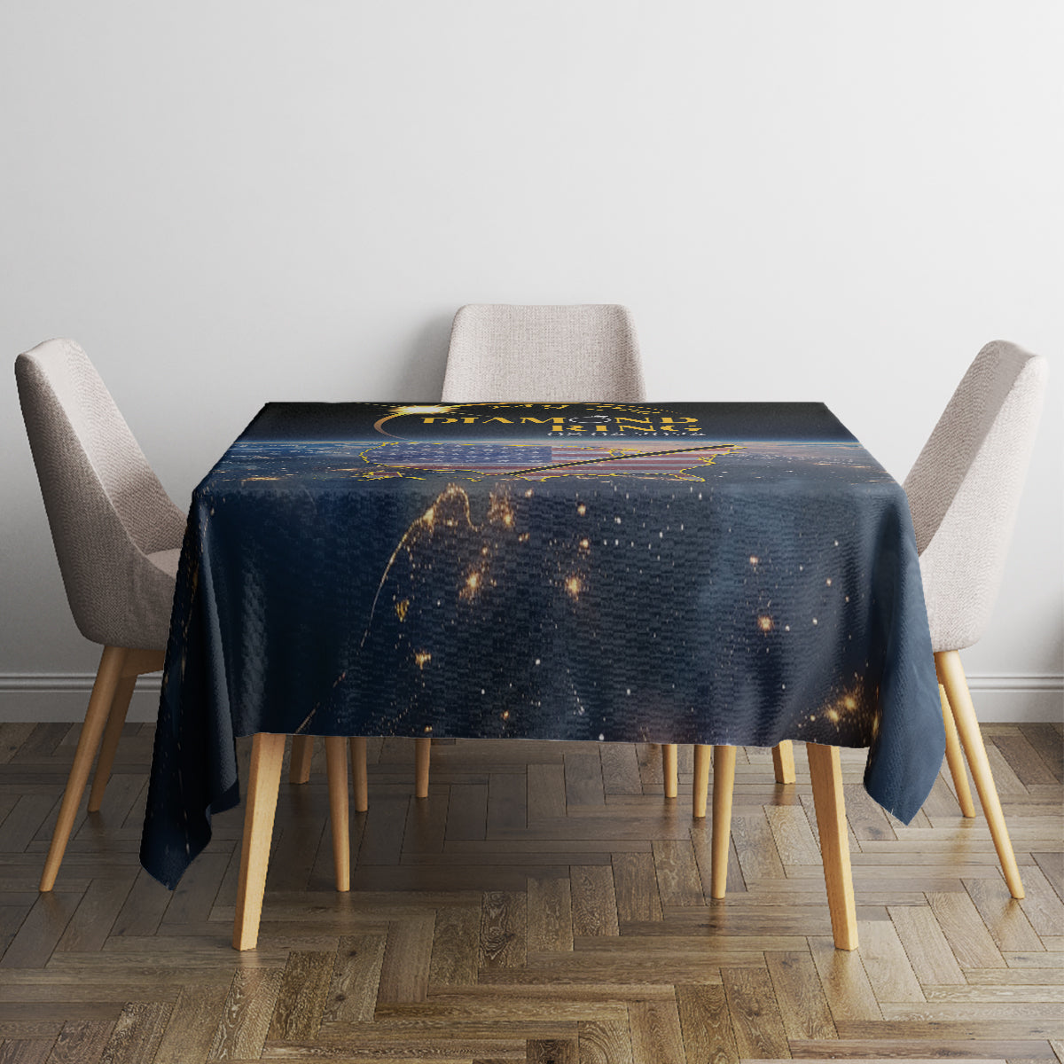 Black rectangular tablecloth with solar-eclipse style print in gold and orange