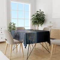 Black rectangular tablecloth with dark sky print, gold/orange cosmic details