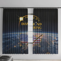 Black window curtains with blue-and-gold graphic, two panels on a curtain rod