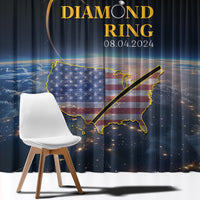 Black curtain panels with blue-and-gold eclipse and ring graphic, side chair in view