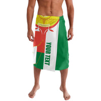 Lavalava wrap skirt with green and white graphic panel and colorful emblem