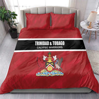 Red duvet cover and two pillowcases with black/white stripe and Trinidad crest
