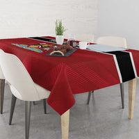Red rugby tablecloth with black-and-white border stripes and central emblem, table corner drape