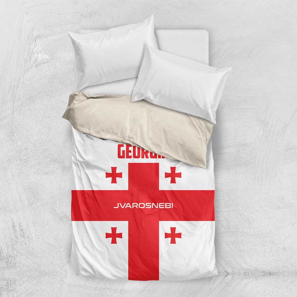 Georgia bedding set with white cover, red cross motif, and red Georgia text on duvet.
