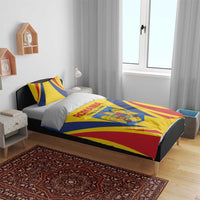 Romania football bedding set on bed: yellow duvet with blue center panel and crest