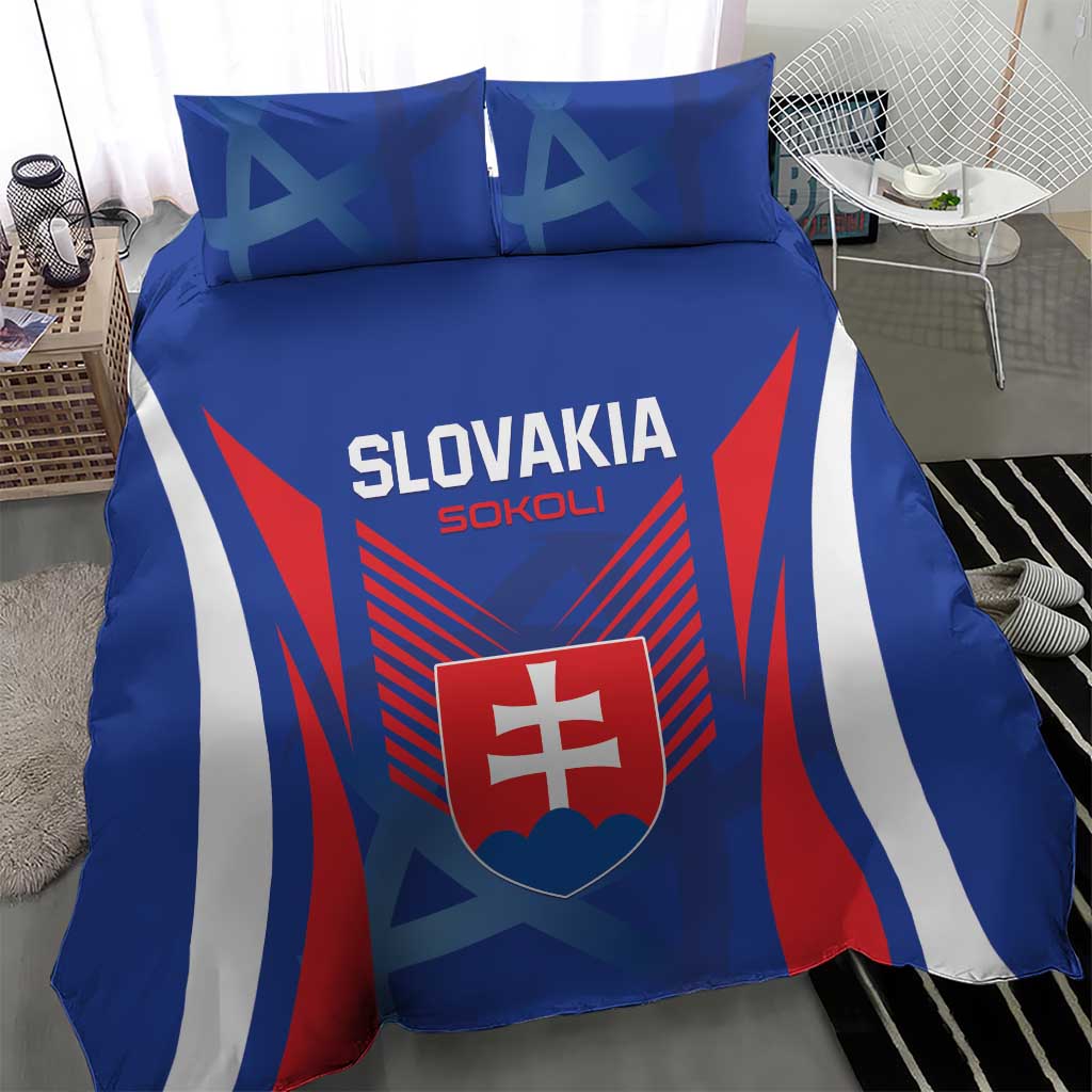 Blue duvet cover and pillows with Slovakia SOKOLI text and shield crest