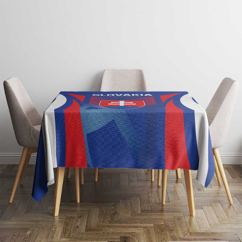 Blue football tablecloth with Slovakia emblem and red center panel on dining table
