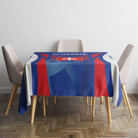 Blue football tablecloth with Slovakia emblem and red center panel on dining table