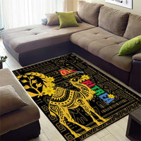 Black area rug with gold camel and geometric border pattern