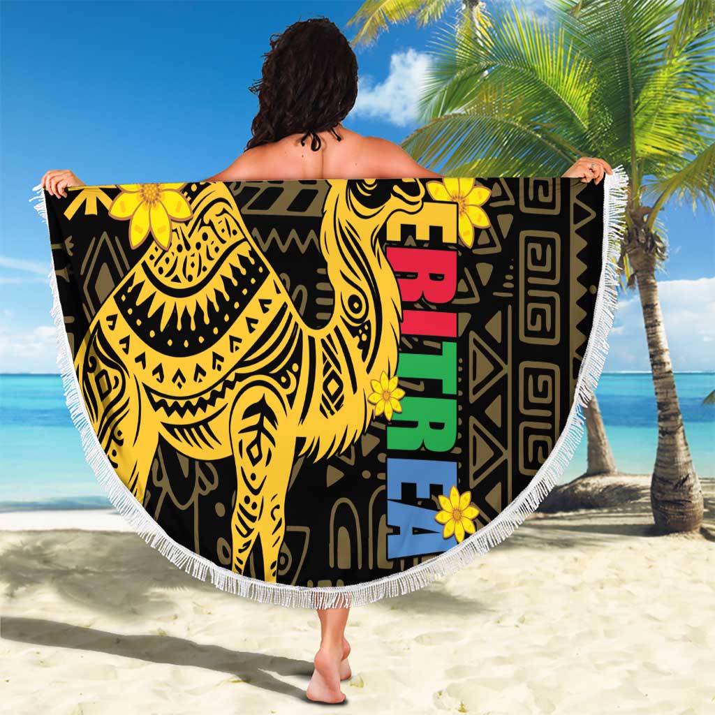 Round beach blanket with black and gold camel artwork and multicolor vertical text, fringed