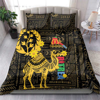 Black bedding set with gold camel graphic, floral motifs, and central Enkutatash logo