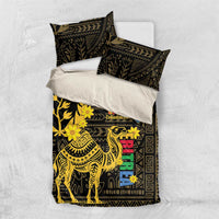 Black bedding set flat lay with gold camel motif and two matching pillowcases