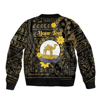 Unisex black bomber jacket back with camel emblem, gold floral geometric detailing, ribbed hem