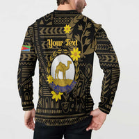 Black back of button-up sweatshirt with camel emblem and geometric African pattern