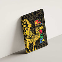 Canvas wall art angled on the wall, gold camel and floral design with colorful text on black