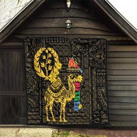 Black quilt with yellow camel and colorful Eritrean-style pattern blocks