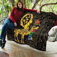 Black quilt with bright yellow camel artwork and colorful stacked panel accents