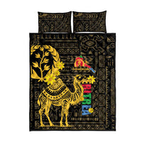 Black quilt bed set with folded corner pillows, camel motif and geometric prints