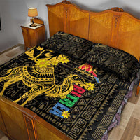 Black and gold camel patterned quilt bed set with matching pillows and colorful accents