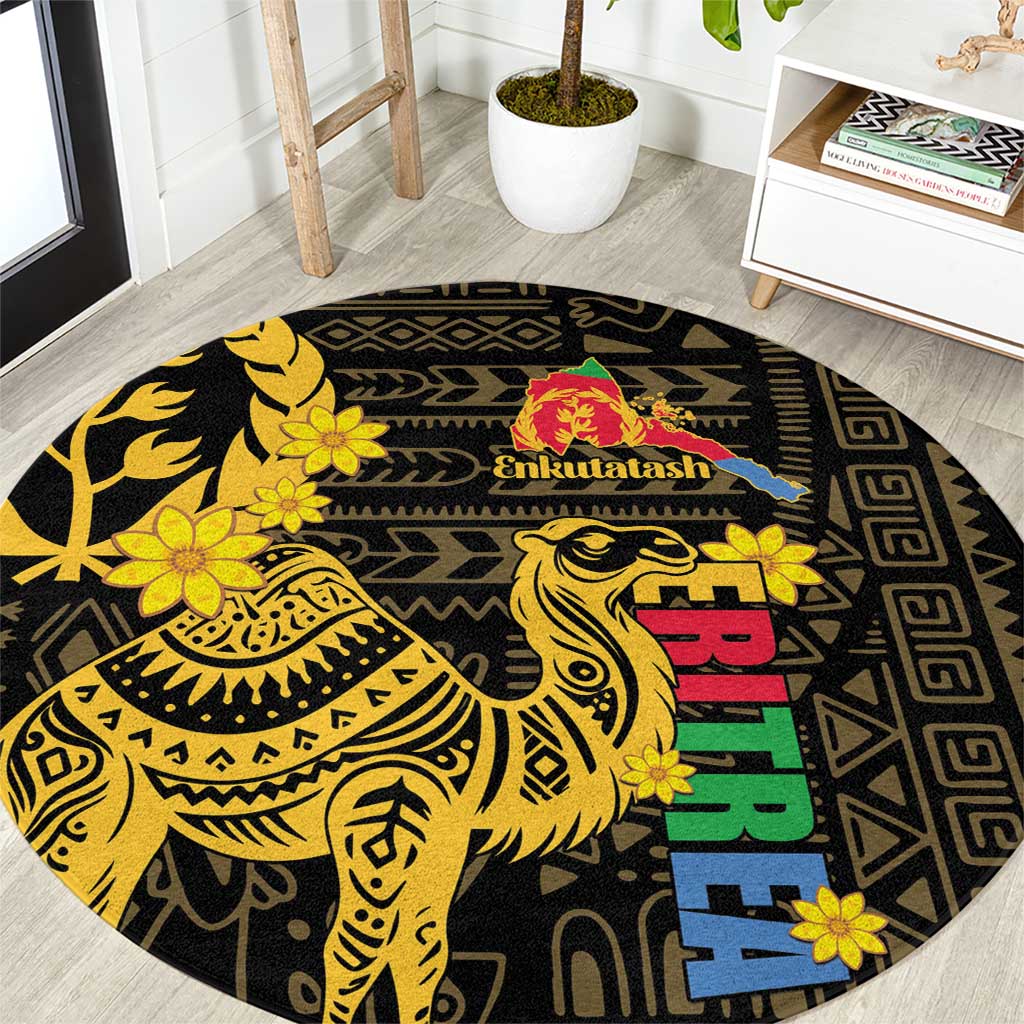 Round black rug with yellow camel, flowers, and geometric pattern with colorful accents