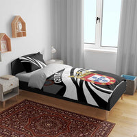 Ceuta-themed black-and-white duvet set with striped design, crest, and two pillowcases