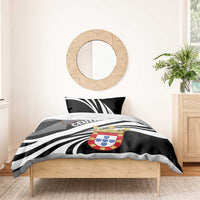Black and white duvet cover set with striped pattern, Ceuta crest, and matching pillows