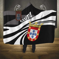 Black and white striped hooded blanket with Ceuta text and crest