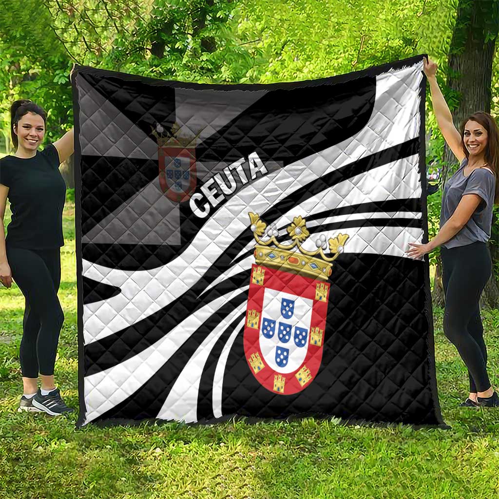 Black and white day quilt with crest emblem and CEUTA lettering, radial striped design