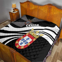 Black and white bed quilt with crest emblem and CEUTA lettering, curved stripe pattern