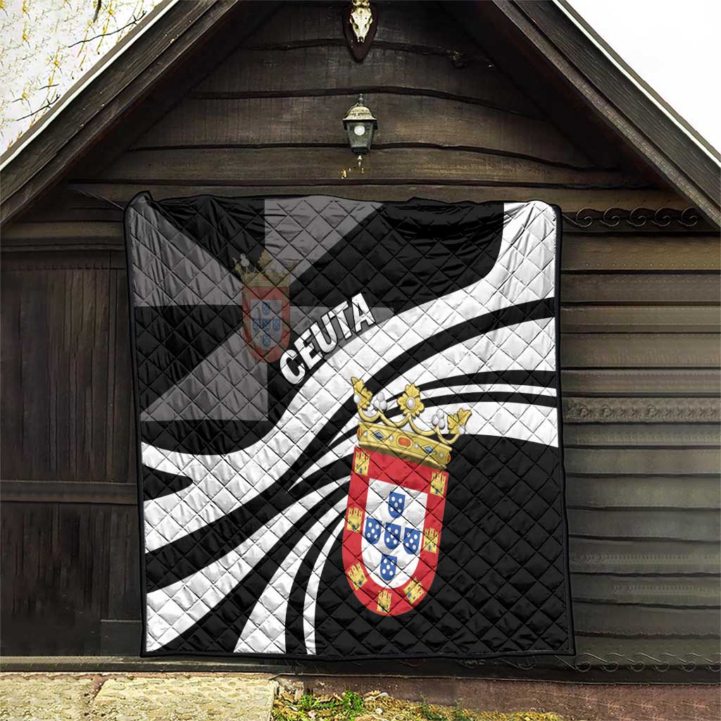 Black and white quilt with crest emblem and CEUTA lettering, radial striped design