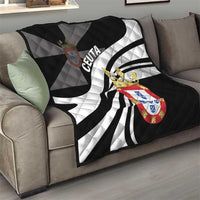 Black and white quilt blanket with crest emblem and CEUTA lettering, bold stripe design